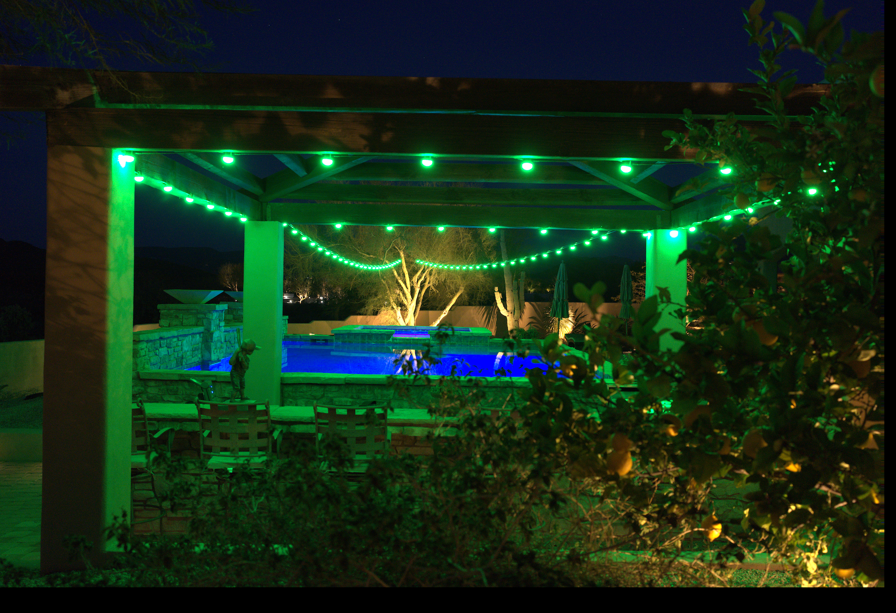 outdoor LED lighting installed along modern backyard patio steps